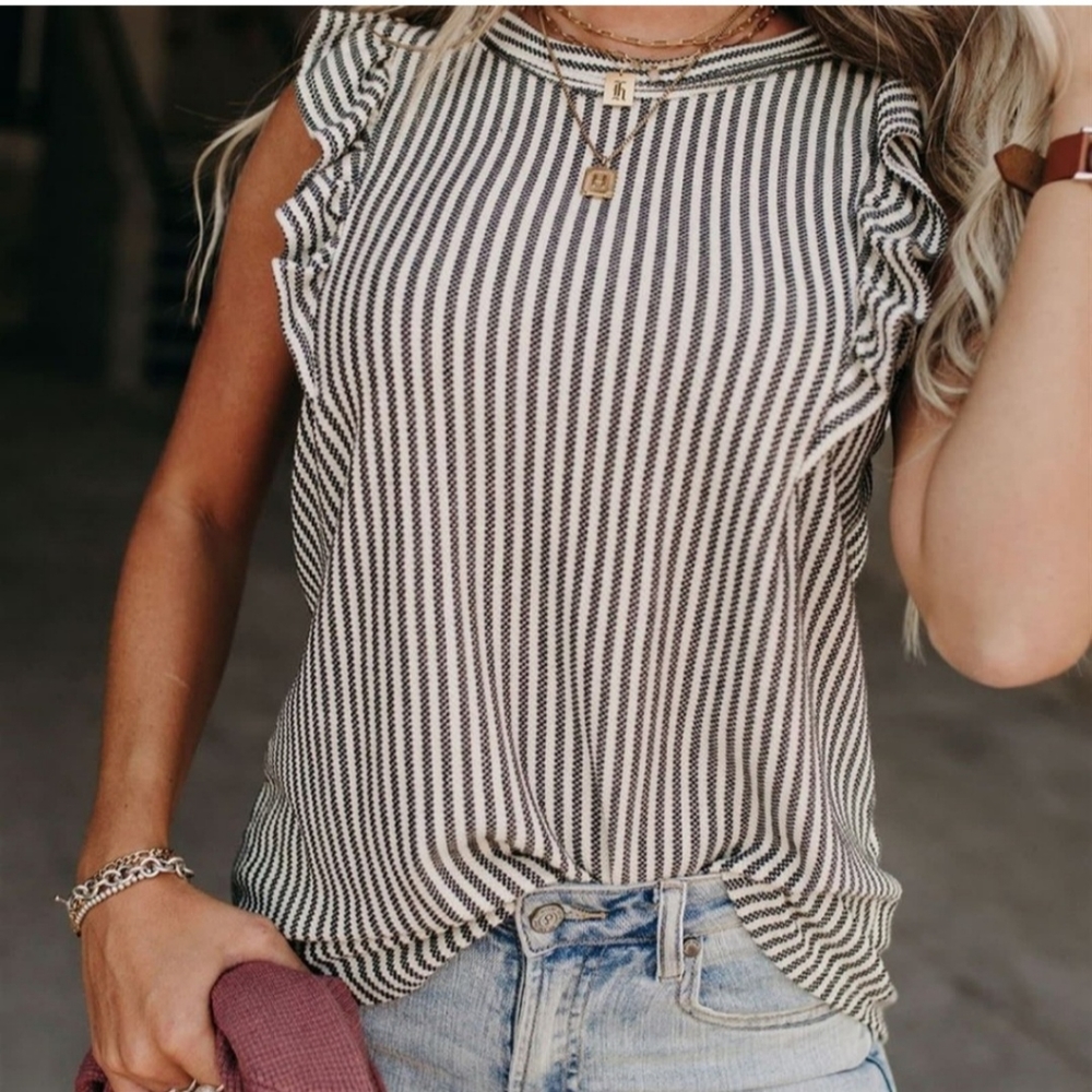 White top with black striped and ruffle sleeves